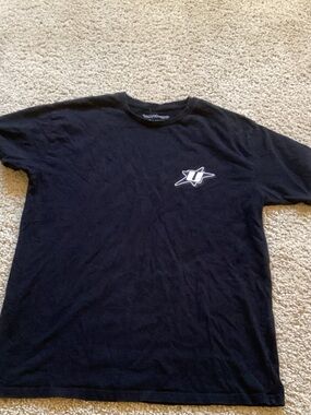 Black Short-Sleeve Tee with Small White Chest Emblem